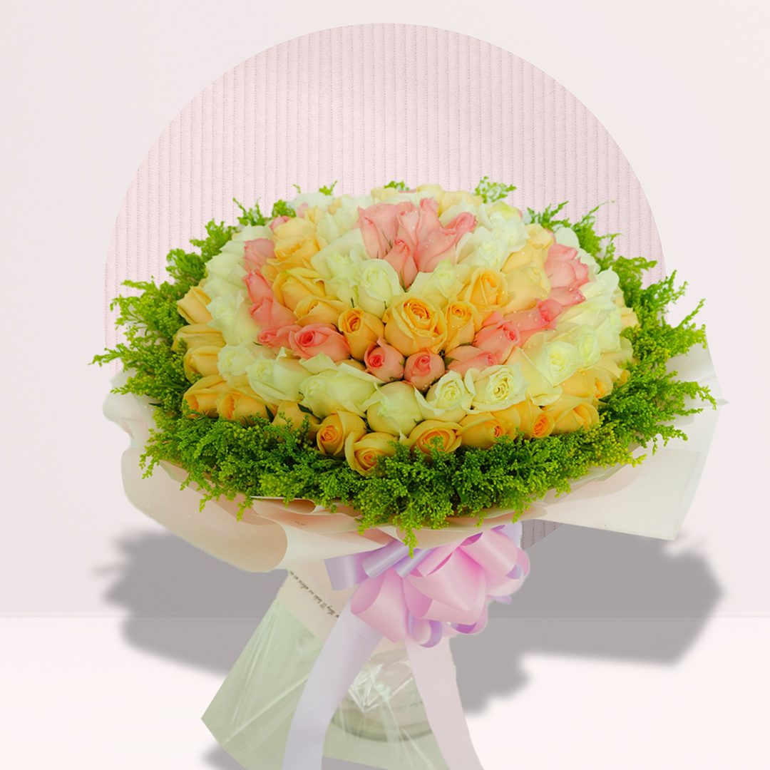 Rose Bouquet 99 blush pink peach and ivory rose bouquet with seasonal greenery