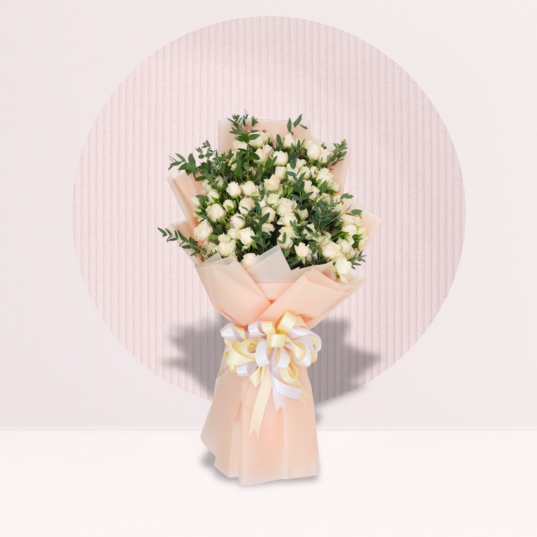 10 (6) Peach spray rose bouquet with greenery in soft peach wrapping