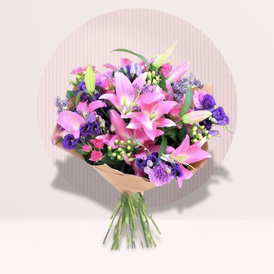 31 Pink lily purple eustoma bouquet with fresh greenery and seasonal filler flowers