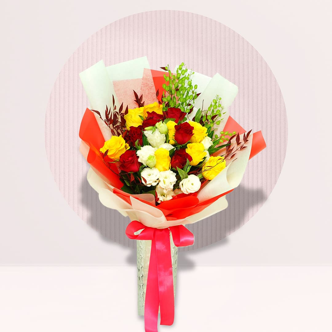 Rose Bouquet Red and yellow rose bouquet with white eustoma and seasonal greenery