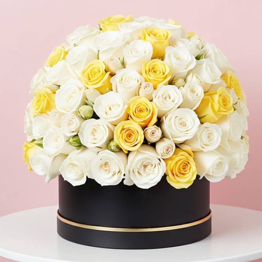 Signature Box of White and Yellow Roses-01 white and yellow roses arranged in a black round flower box