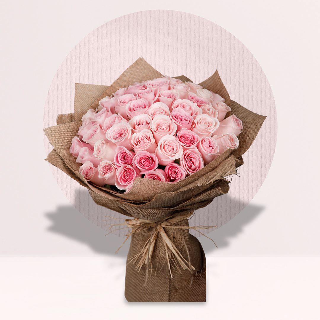 1 40 Pink roses in bouquet wrapped in rustic burlap