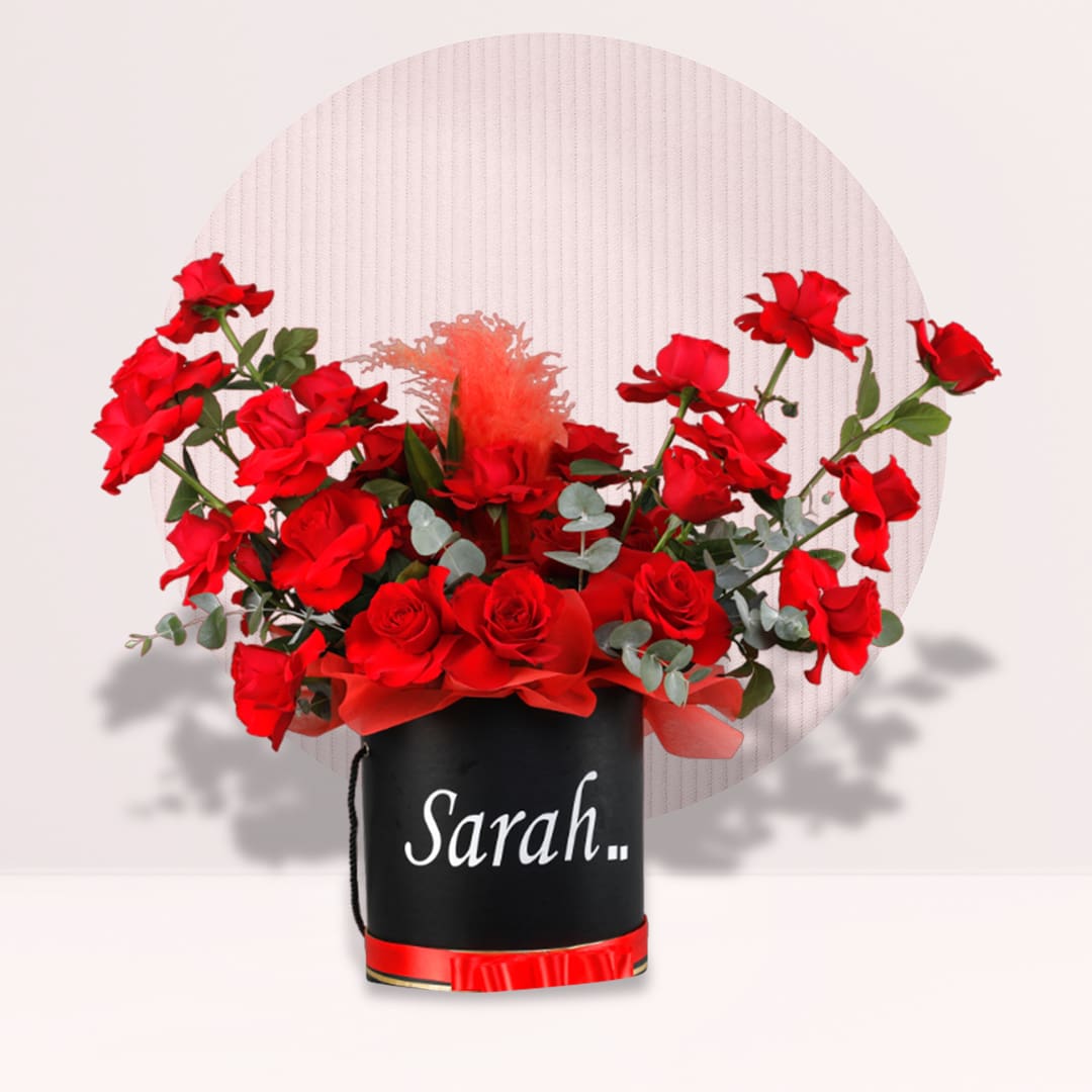 5 red rose flower box with eucalyptus in black hat box