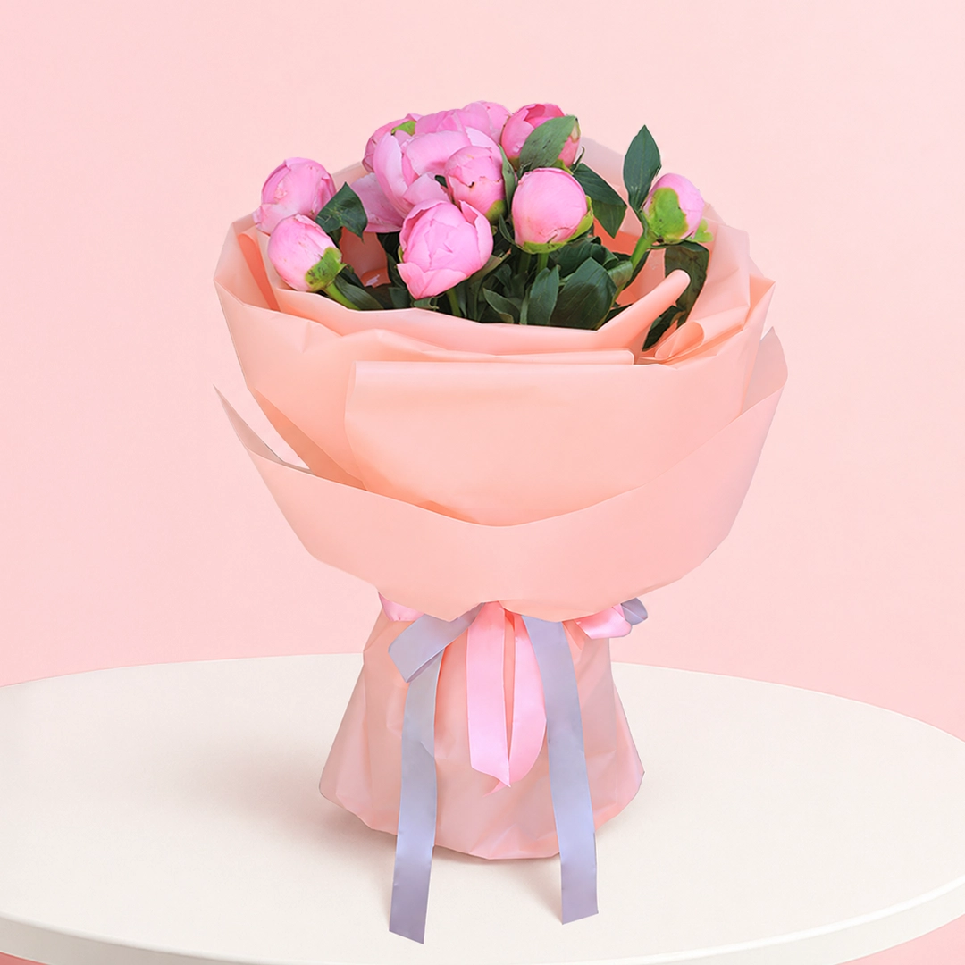 prettiest-pink-peonies_2026 A vibrant bouquet of 10 pink peonies, exuding beauty and charm, perfect for capturing hearts and uplifting spirits