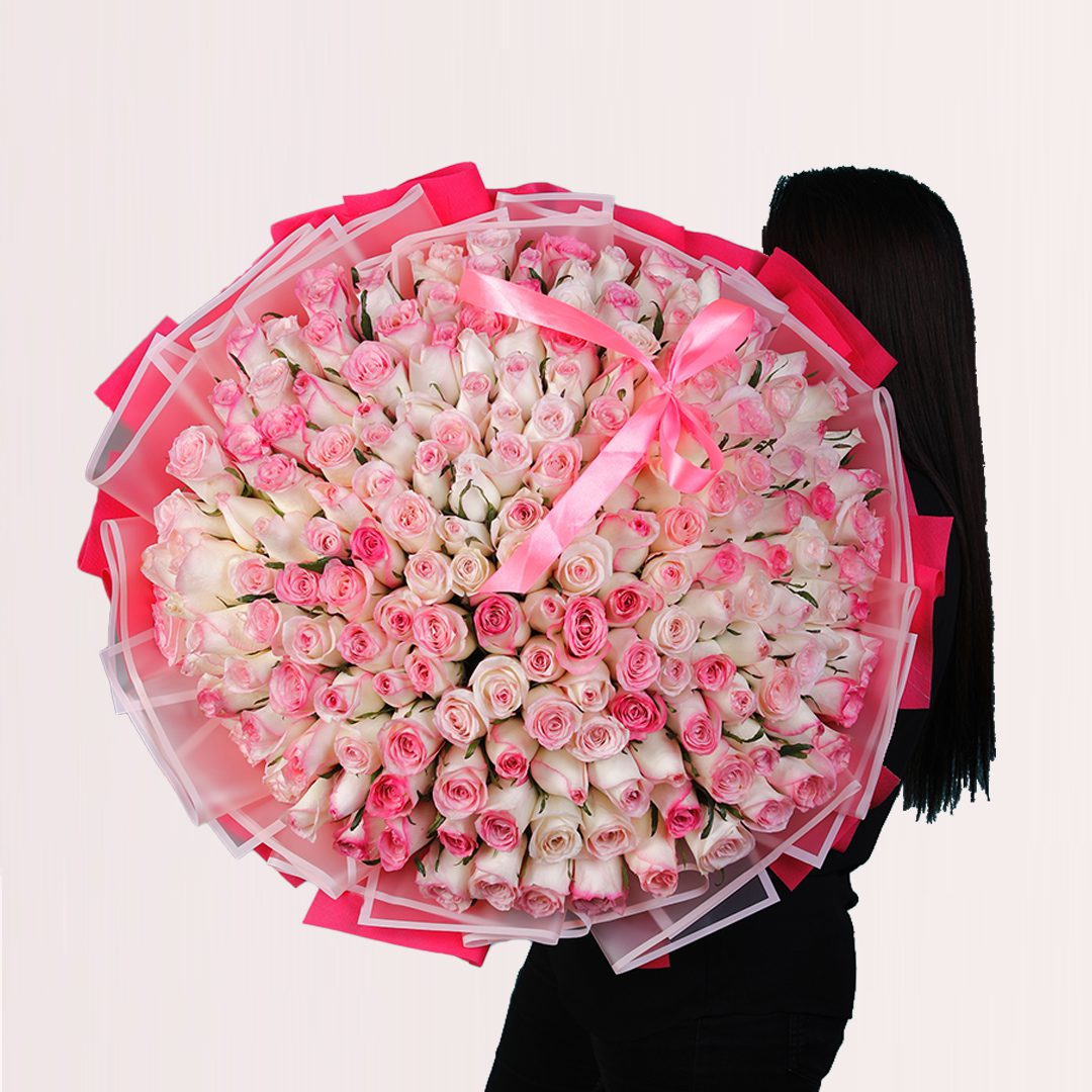 1 premium large bouquet of 150 fresh pink roses with layered pink wrapping and ribbon.