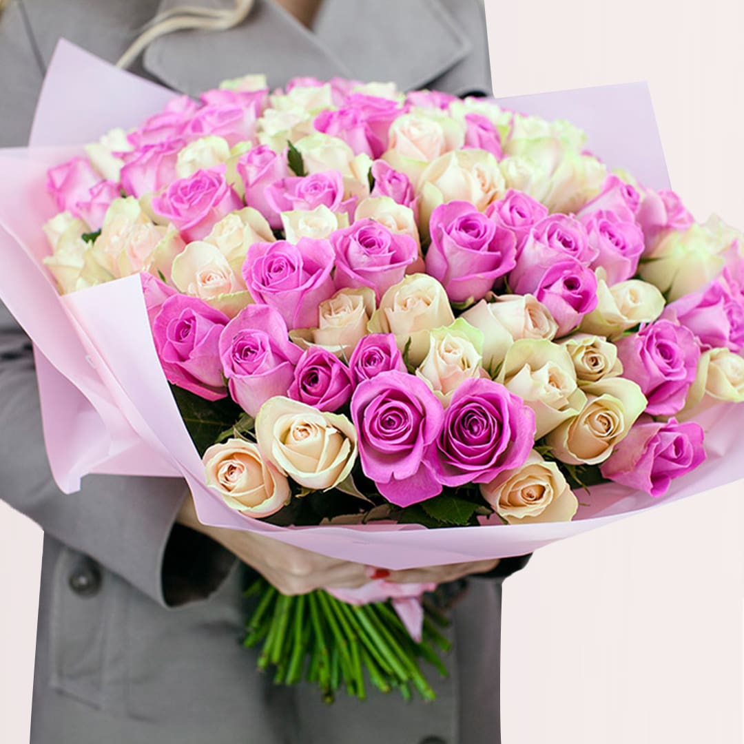 3s (3) 100 fuchsia pink and white roses arranged in a large romantic hand bouquet