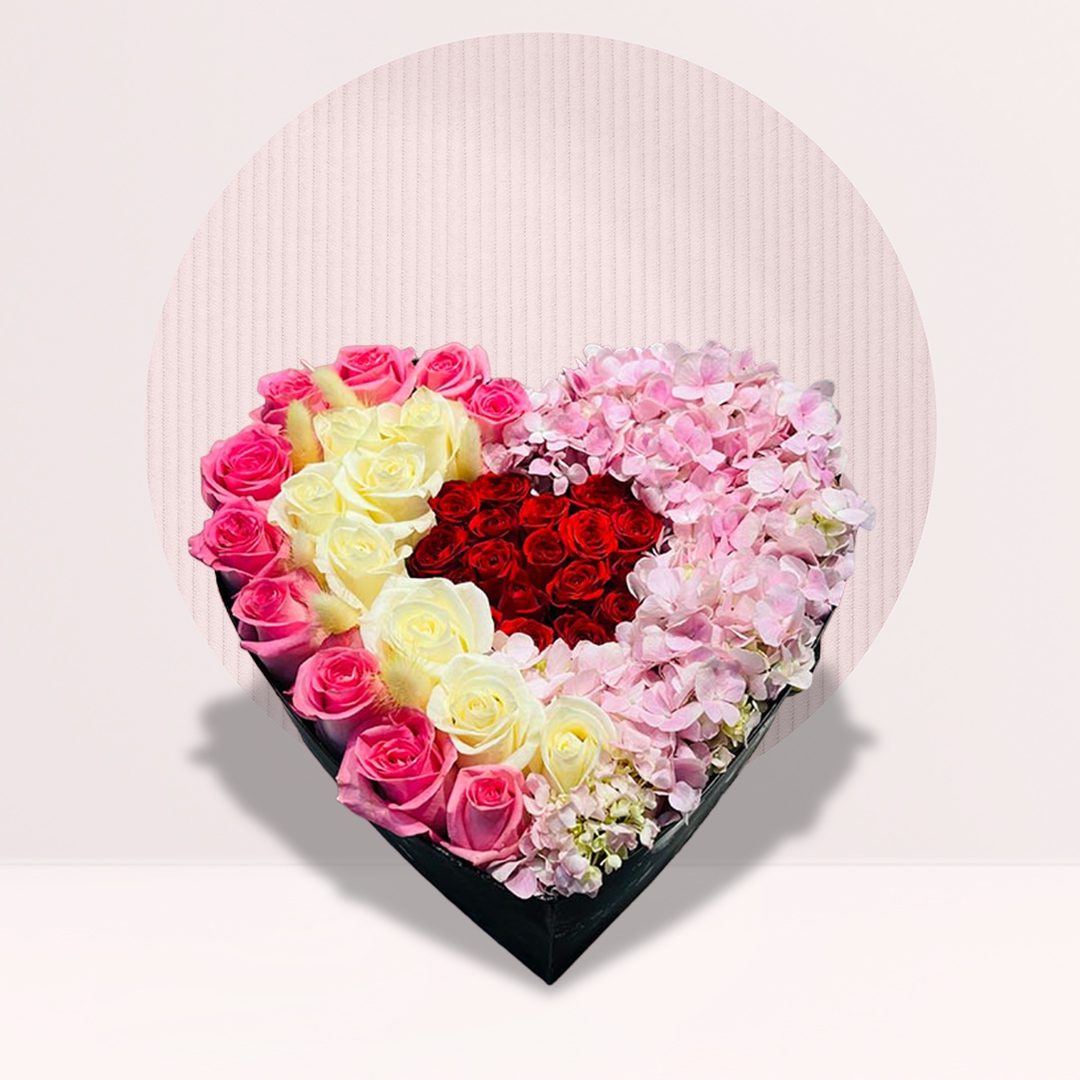 1 (75) Pink and ivory rose heart box with red spray roses and pink hydrangeas