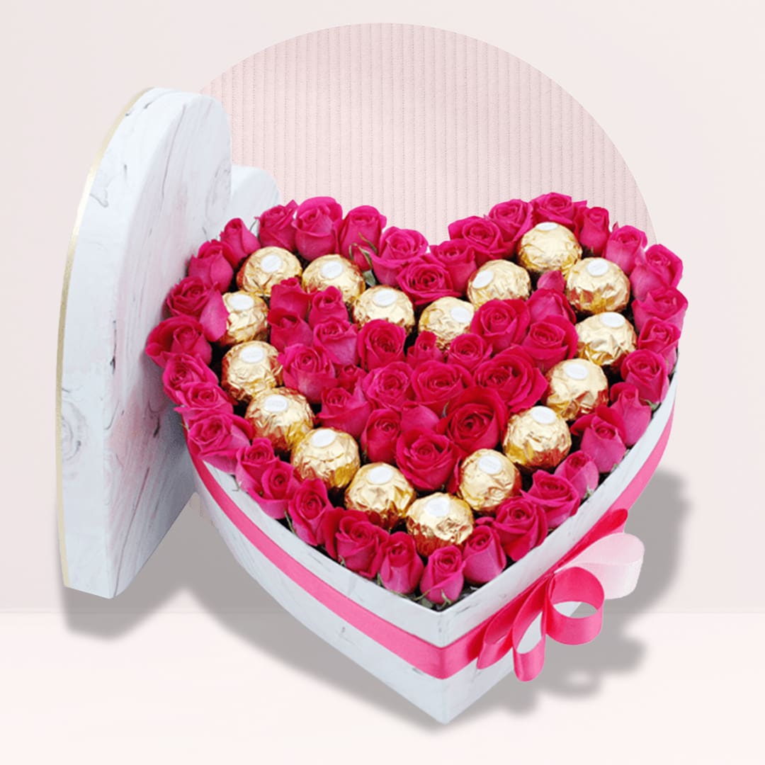 1 (89) Sweetheart Rose Chocolate Box featuring 25 dark pink roses, 10 dark pink spray roses, and Ferrero Rocher chocolates arranged in an elegant heart-shaped gift box.