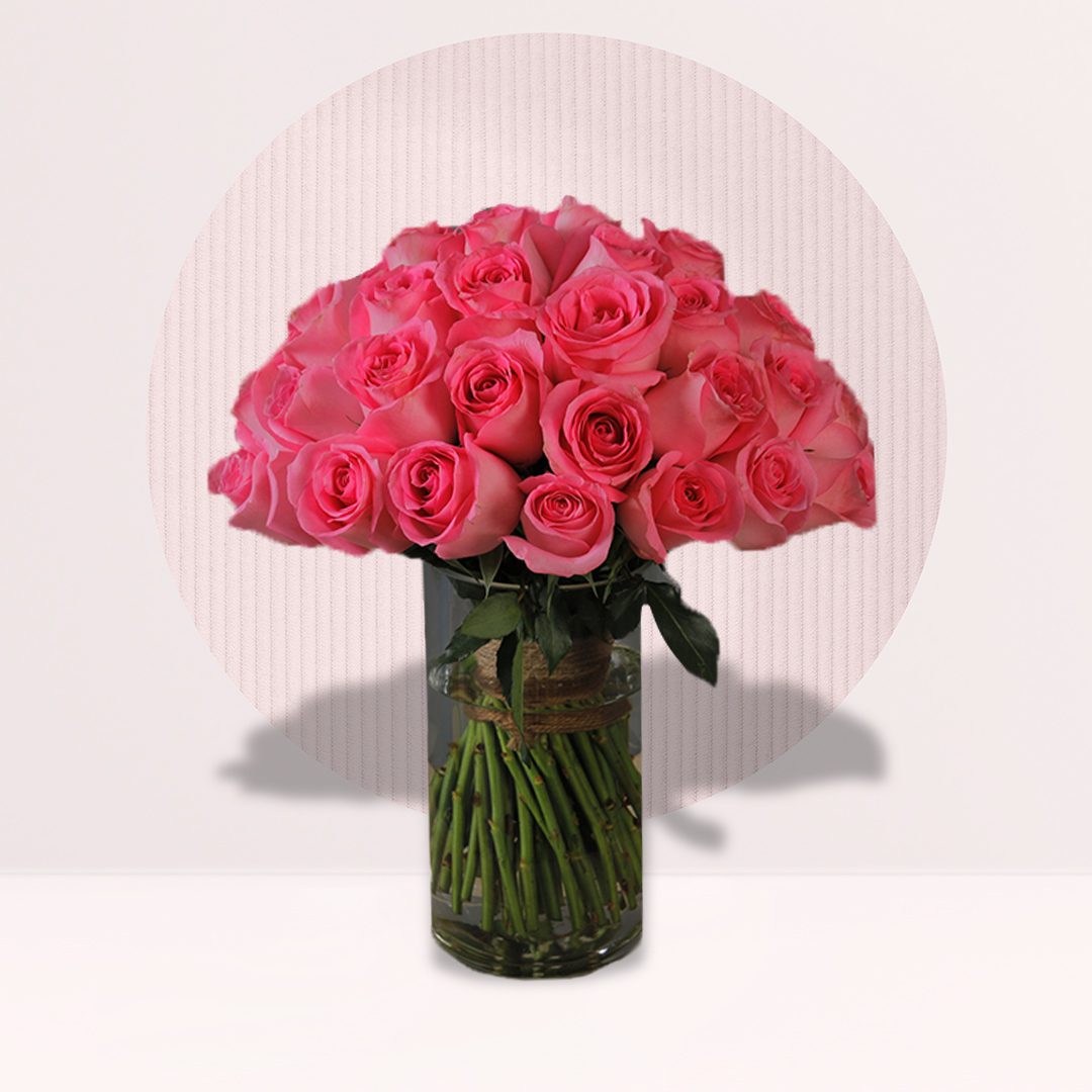 1 (9) hot pink roses in a vase
