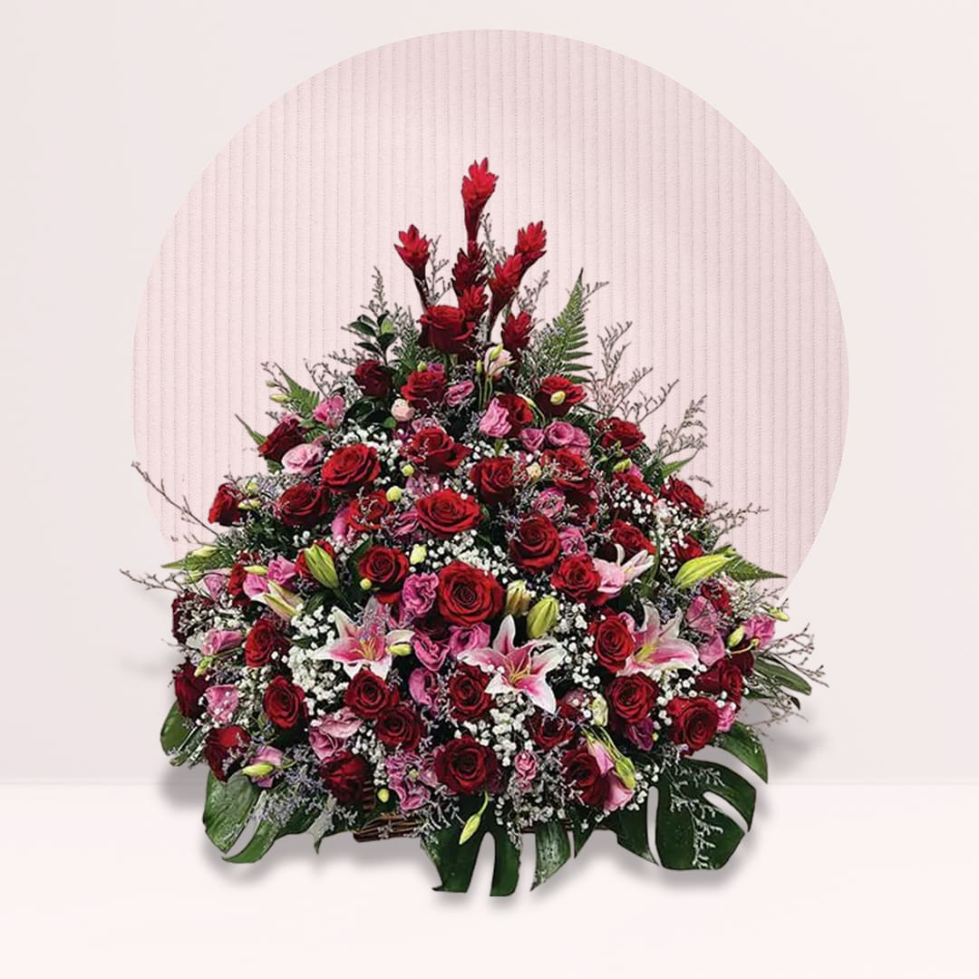 24 romantic arrangement filled with fresh red roses.