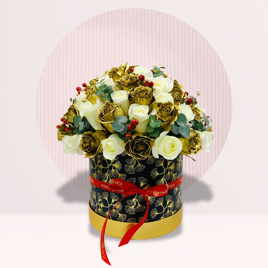 7 (8) Golden and white rose flower box with red berries and eucalyptus