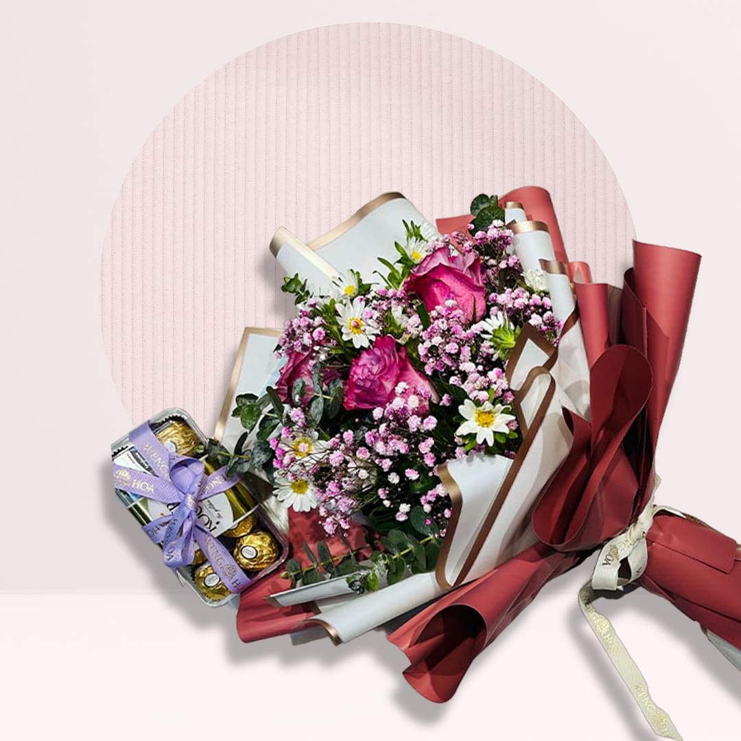 Bouquet Purple rose bouquet with Ferrero Rocher chocolates, pink fillers and elegant red wrapping