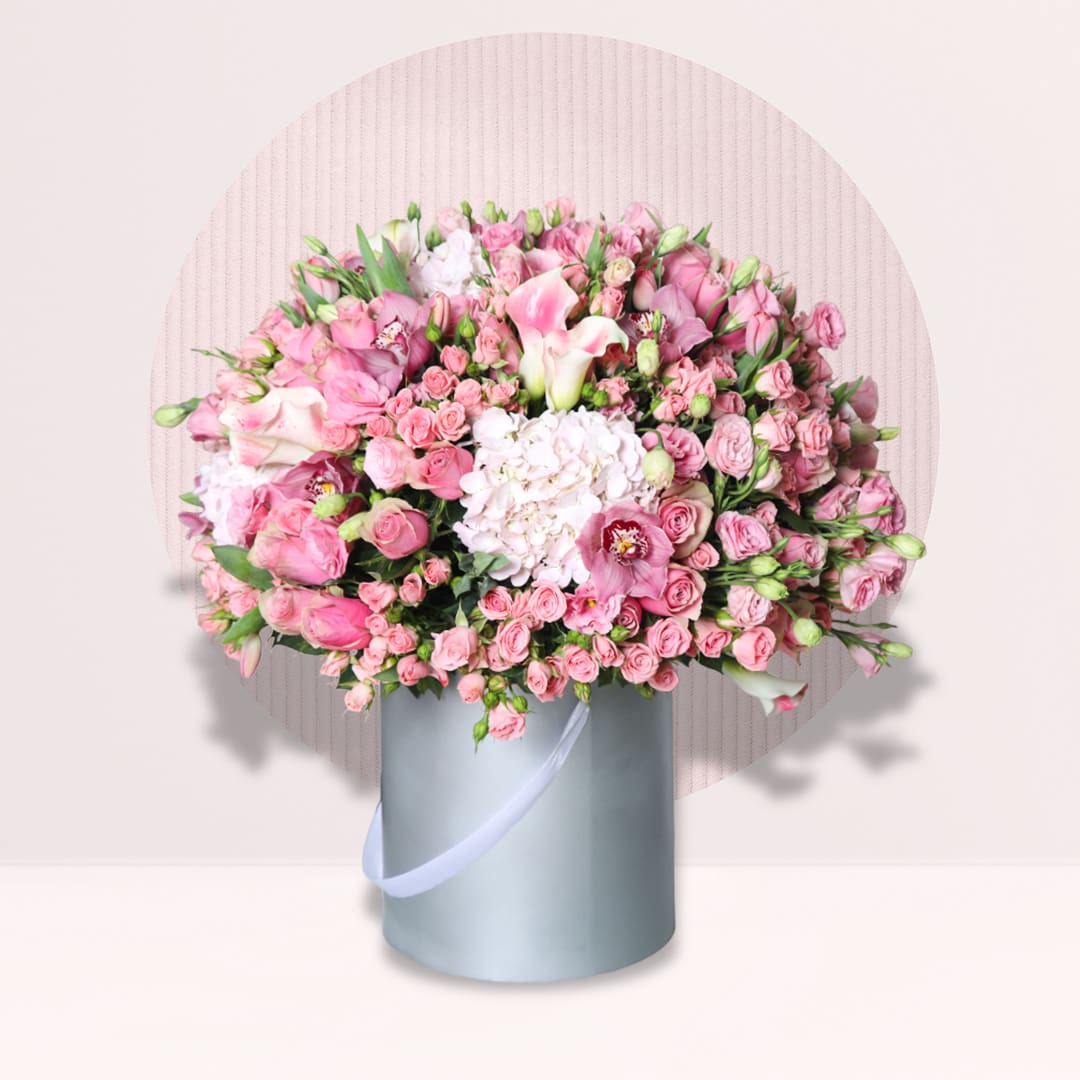 1 Pink roses and spray roses with pink hydrangeas dark pink cymbidium and white calla lilies in flower box
