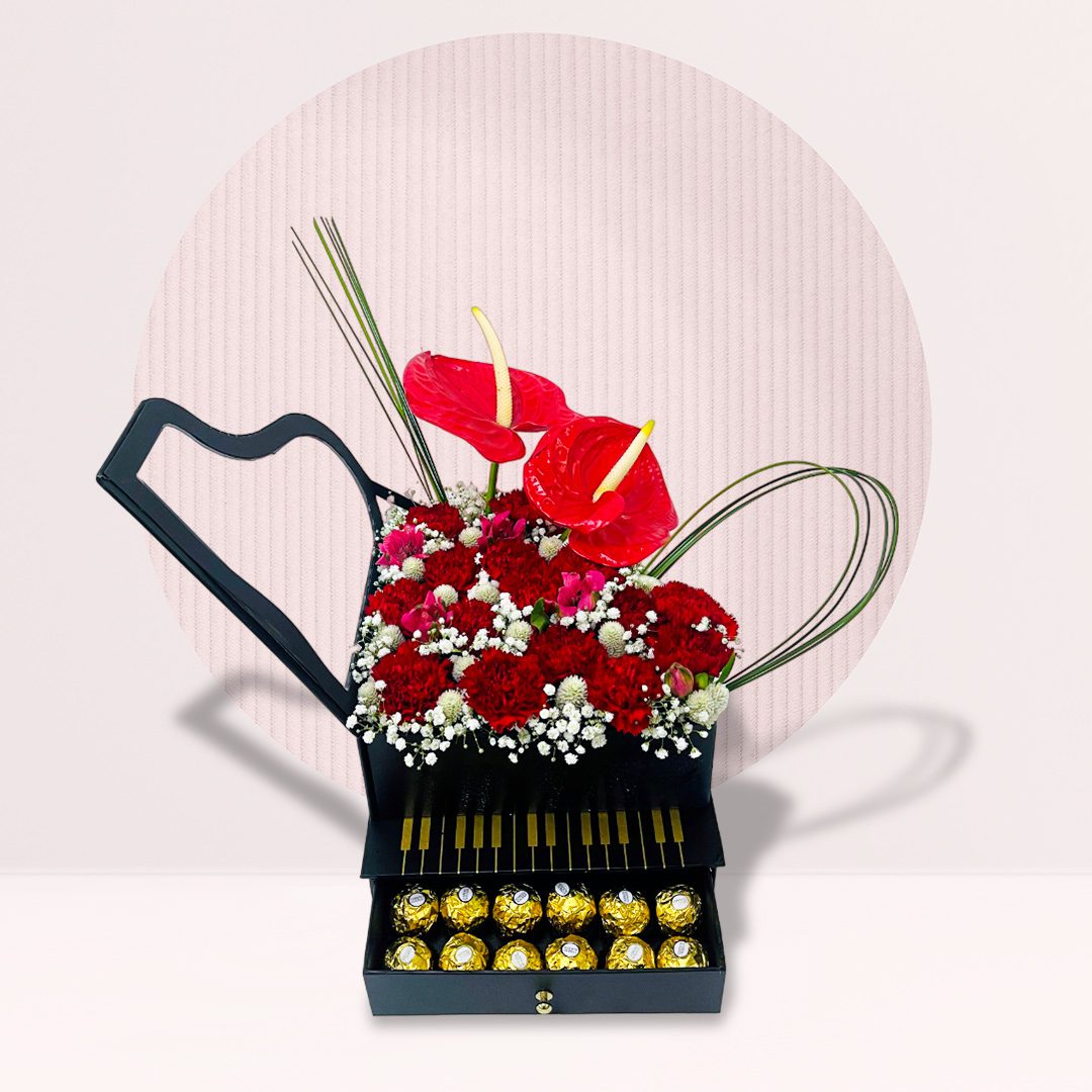 48 Red anthurium and carnation piano box with Ferrero Rocher