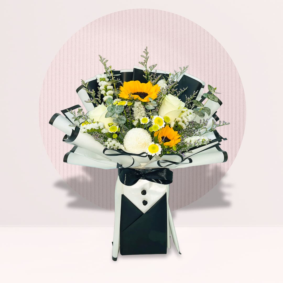 9 hite rose and sunflower bouquet with fillers in black and white tuxedo-style wrapping