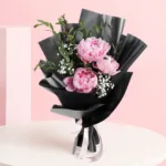 A vibrant Pink Peonies Bouquet featuring hand-picked blossoms, showcasing nature's beauty and contemporary elegance.