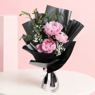A vibrant Pink Peonies Bouquet featuring hand-picked blossoms, showcasing nature's beauty and contemporary elegance.
