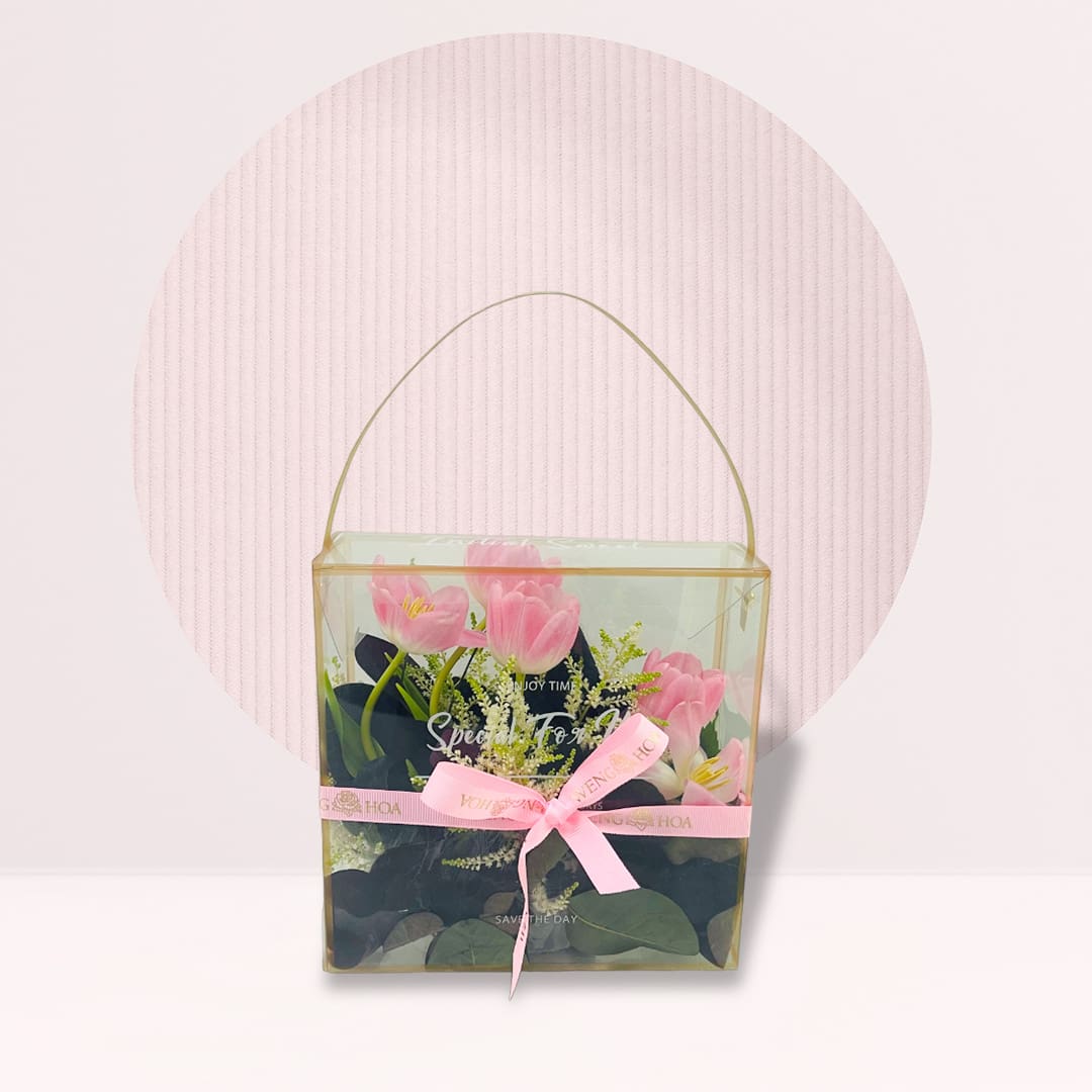 13 Pink tulip arrangement in transparent acrylic gift box with pink ribbon