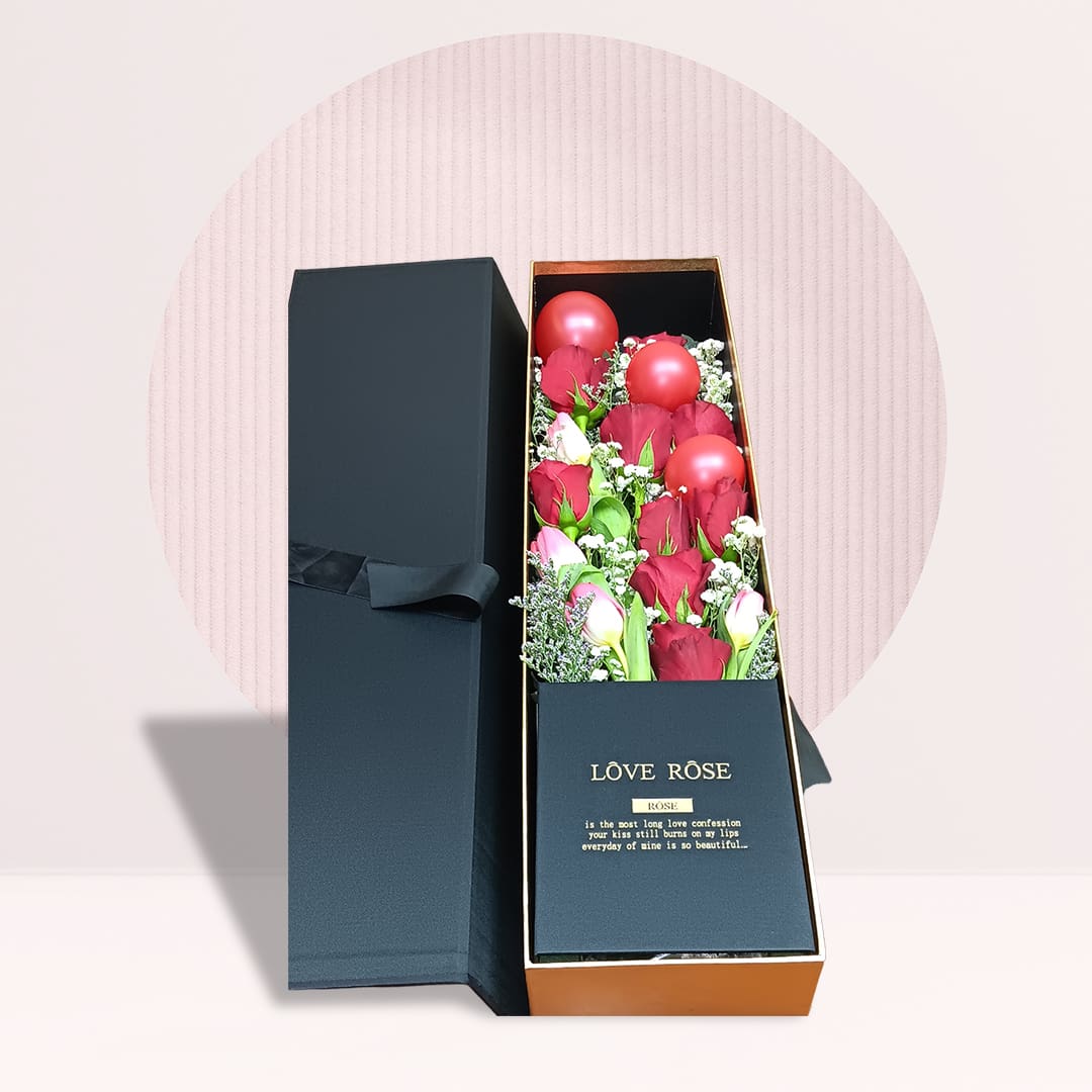 1 Red roses and pink tulips with baby’s breath in rectangular gift box