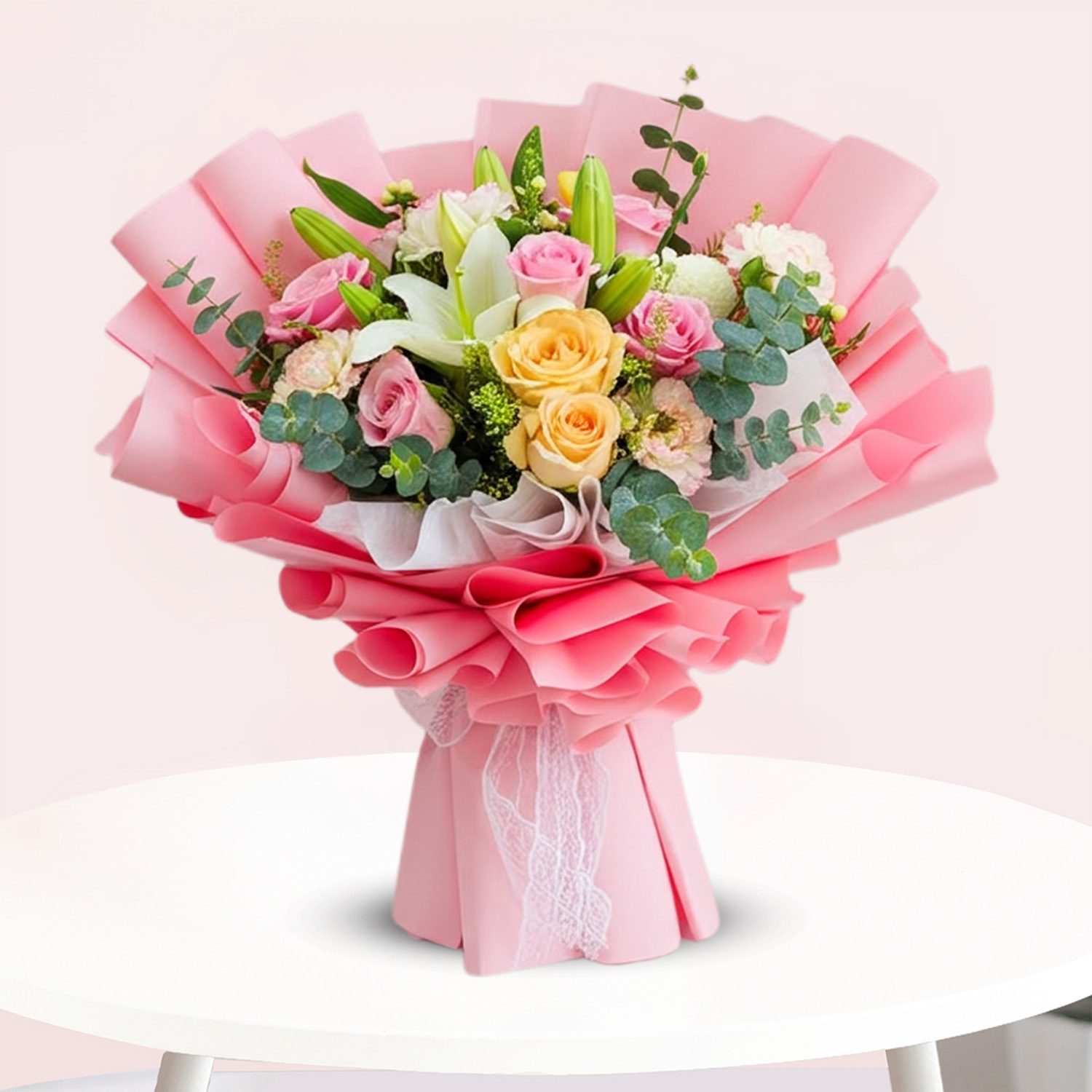 Mixed-Flower-Delight-01 A vibrant bouquet featuring pink and yellow roses arranged elegantly together.