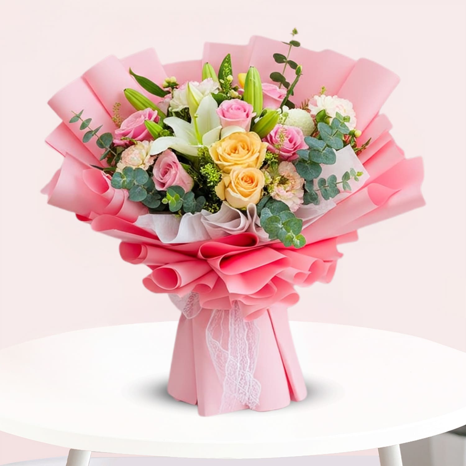Mixed-Flower-Delight-01 A vibrant bouquet featuring pink and yellow roses arranged elegantly together.