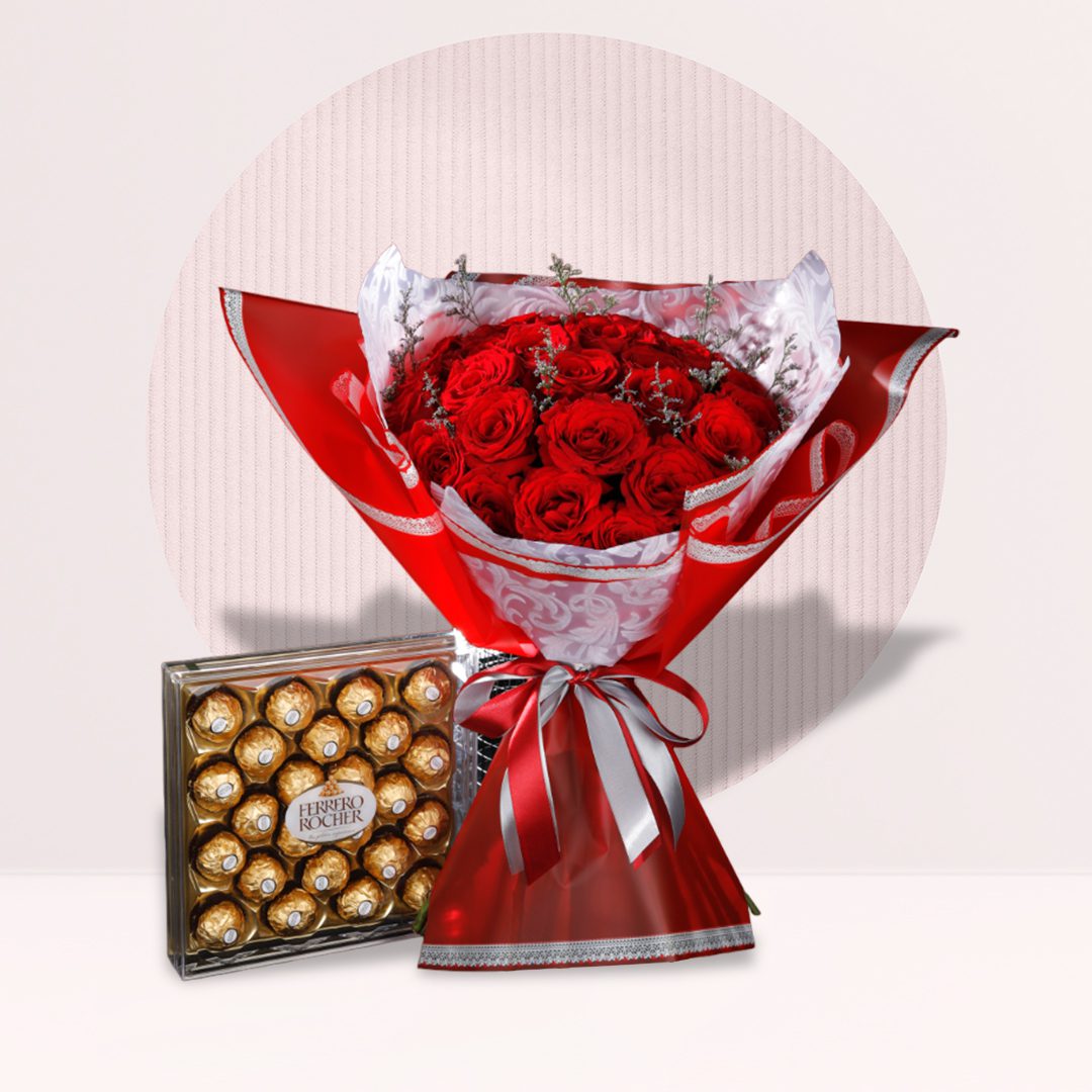 A bouquet of red roses and a box of Ferrero Rocher chocolates.