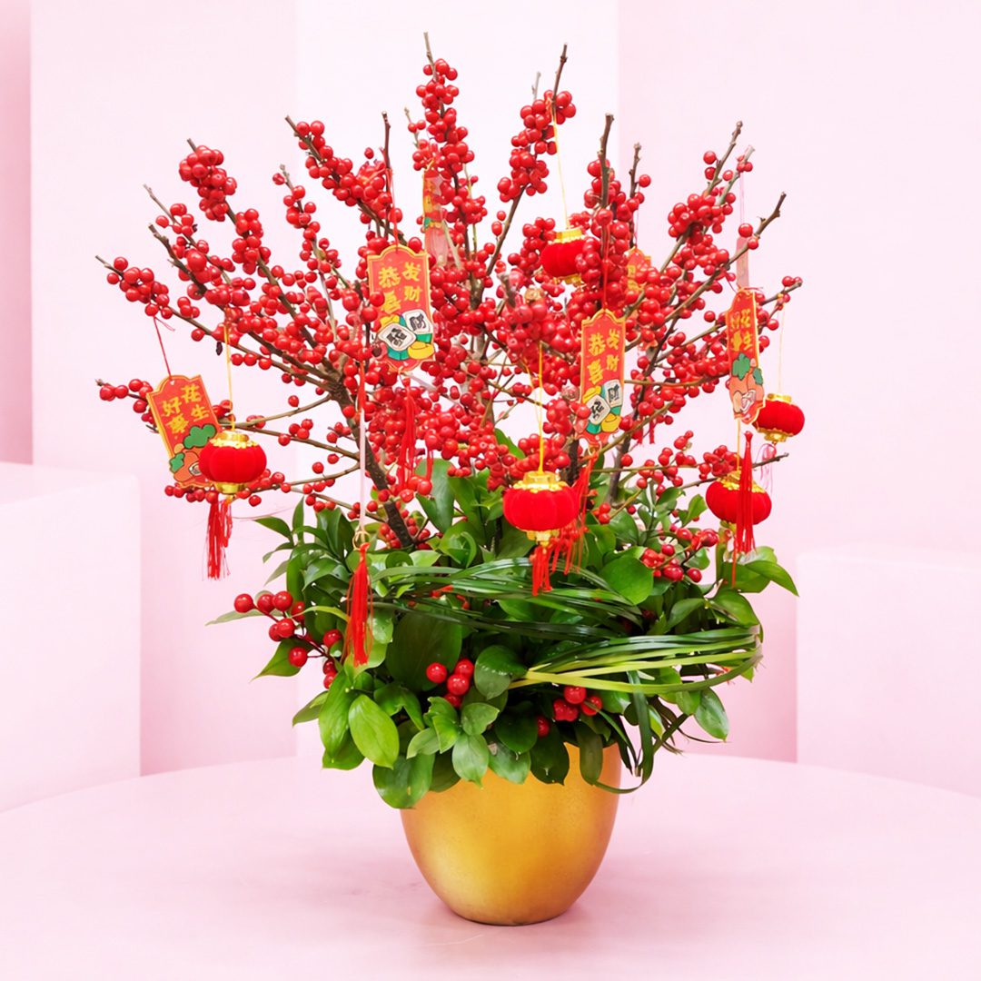 01 Red Berry Prosperity Pot with Red berry branches and lush greens in a gold pot arrangement, with Chinese New Year lantern charms and auspicious tags