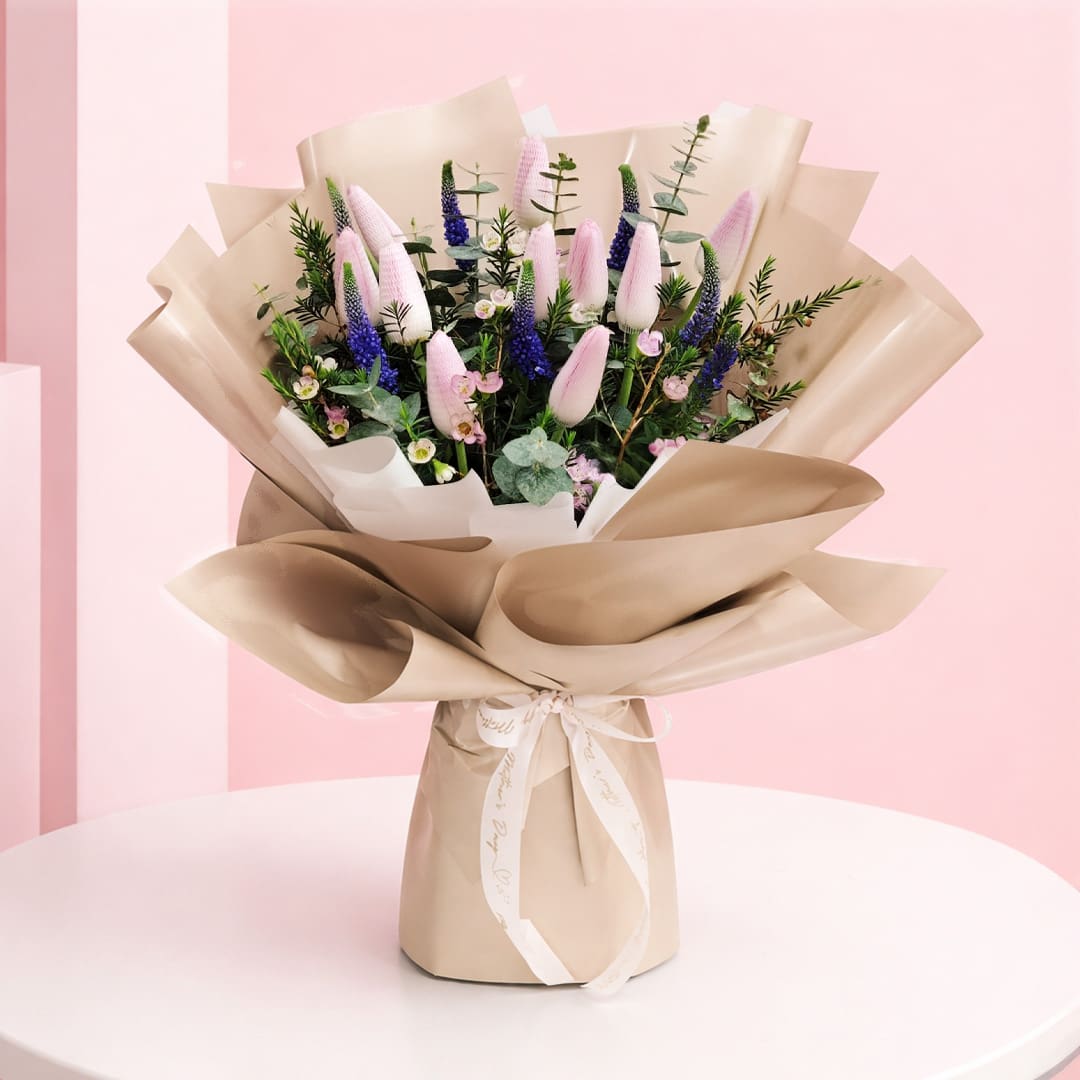 01 featuring pink tulip bouquet purple veronica flowers and eucalyptus foliage in premium beige wrapping, finished with an elegant ribbon bow.