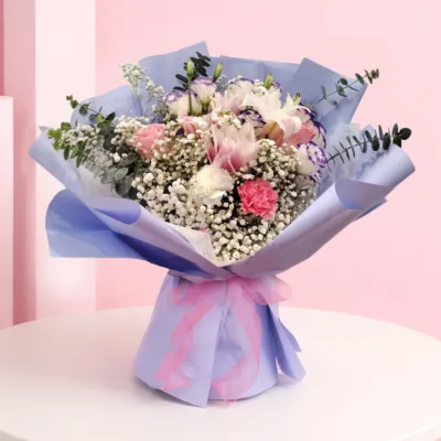 Mother’s Day Floral Harmony featuring carnations, lisianthus, gypsophila, and eucalyptus arranged for Mother’s Day gifting