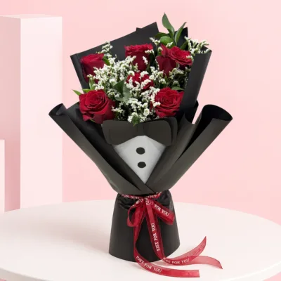 Best Dad Ever Bouquet featuring fresh red roses, baby’s breath, and ruscus leaves arranged in an elegant floral design for Father's Day and appreciation gifting.