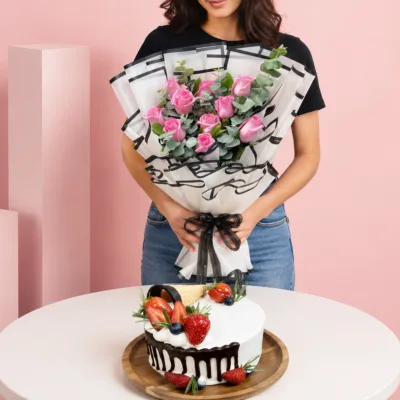 Blueberry Cake & Bouquet Combo featuring a hand bouquet of 10 pink roses paired with a Purple Velvet Chiffon Cake filled with blueberry cream cheese for gifting and celebrations.