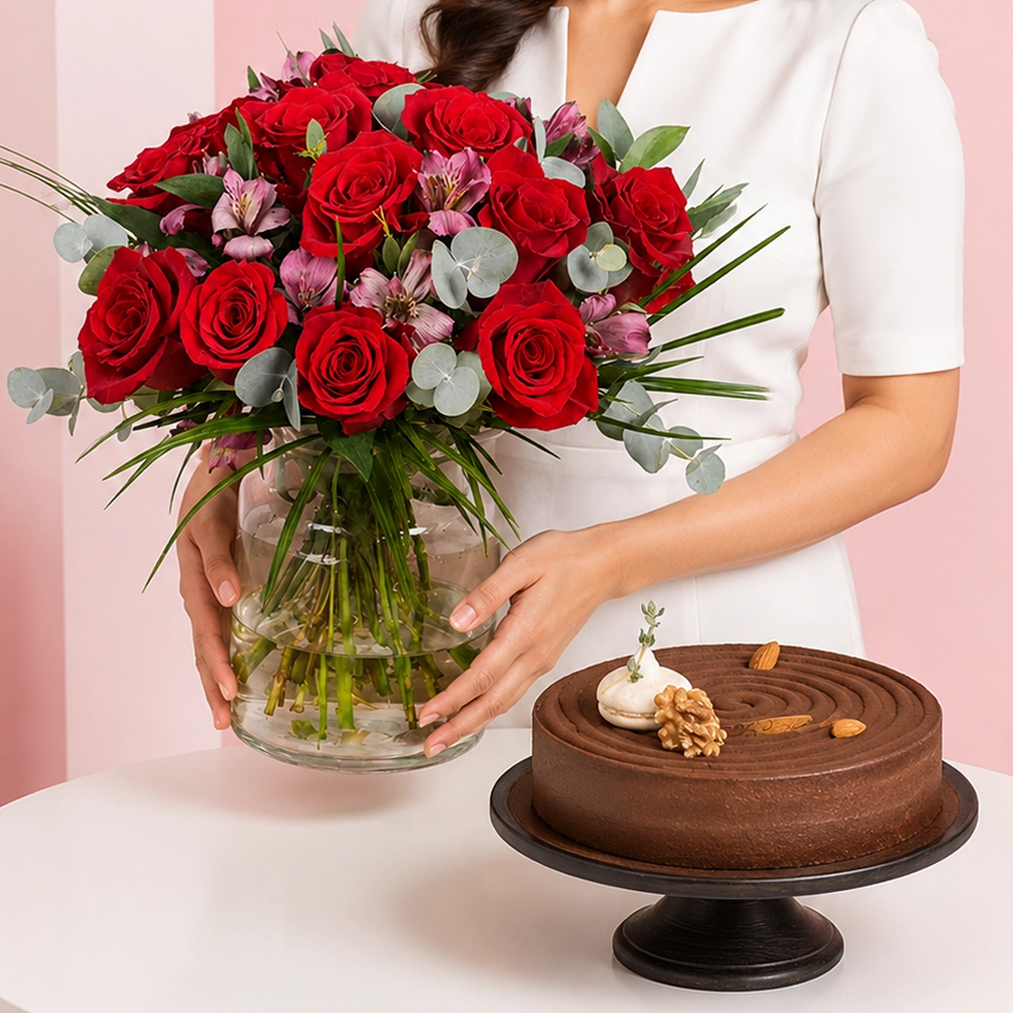 chocolate-cheesecake-flowers-combo Chocolate Cheesecake & Flowers Combo featuring 15 red roses and 5 alstroemerias arranged in a vase paired with a rich chocolate cheesecake made with cream cheese, dark chocolate, and walnuts.