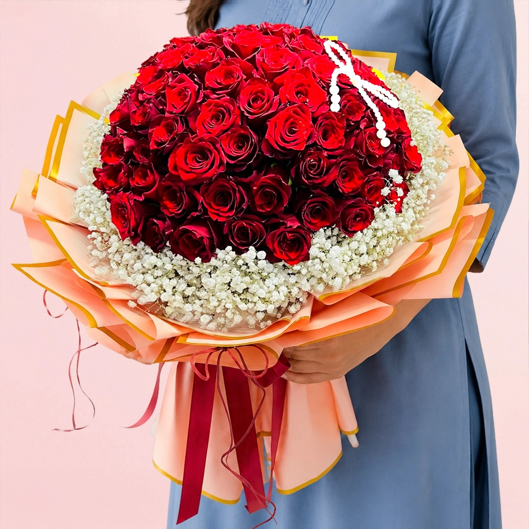 83-red-roses-love-bouquet 83 red roses arranged in premium wrapping and tied beautifully with a red satin ribbon.