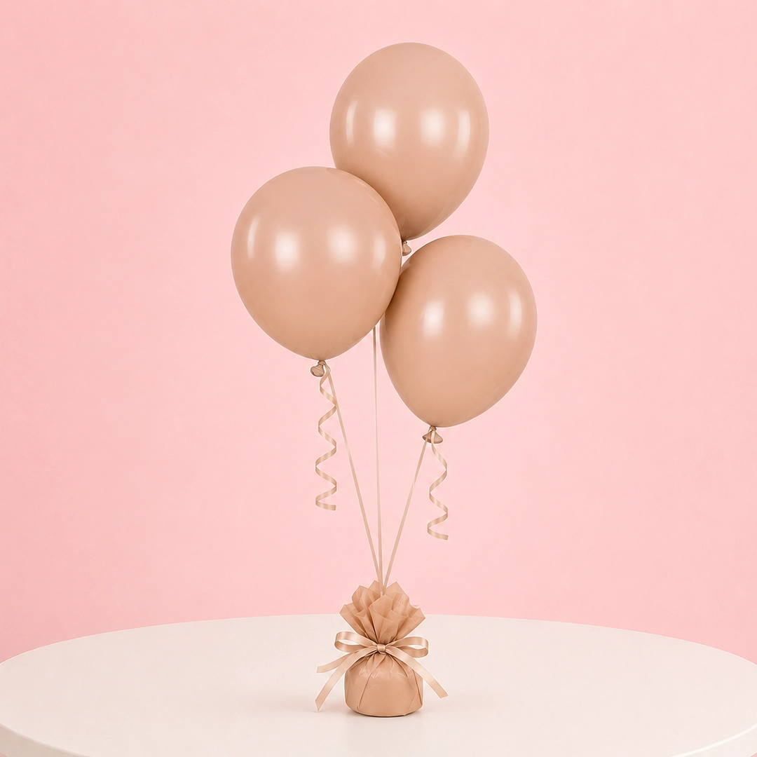 peach-colour-balloon-trio Peach party balloons arranged as a trio for special occasions.