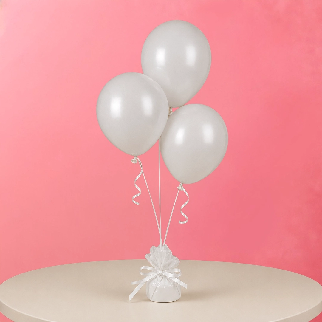 white-colour-balloon-trio White colour balloon trio complementing modern and classic party themes.