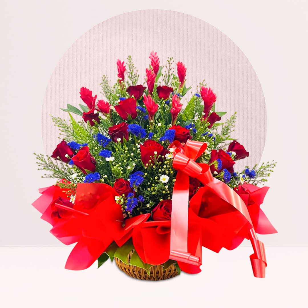 1 (100) Table centrepiece with crimson red roses and fresh greenery.