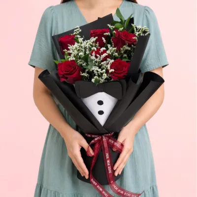 Best Dad Ever Bouquet featuring fresh red roses, baby’s breath, and ruscus leaves arranged in an elegant floral design for Father's Day and appreciation gifting.