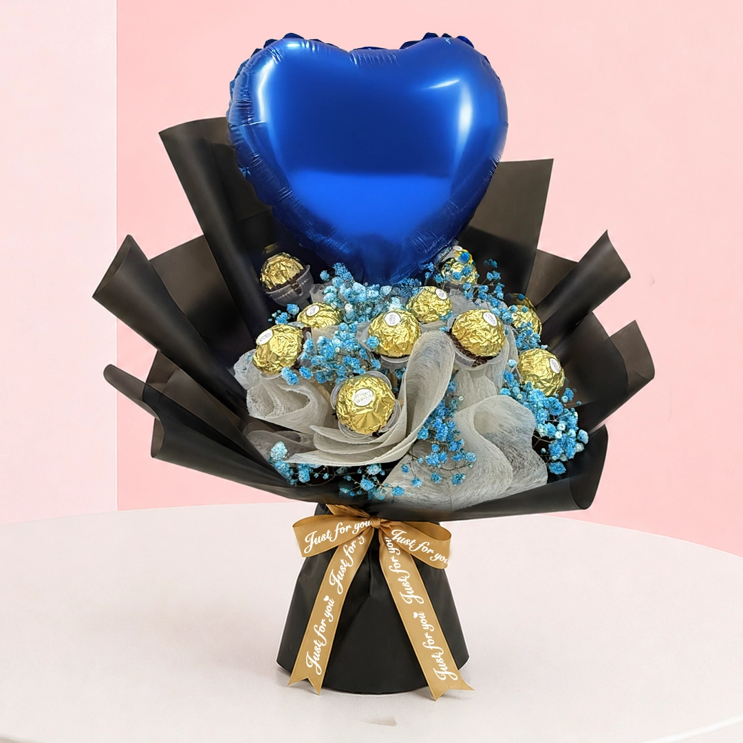happy-fathers-day-bouquet Happy Father's Day Bouquet featuring Ferrero Rocher chocolates, blue-tinted baby’s breath flowers, and a royal blue heart-shaped Happy Father's Day balloon wrapped in elegant presentation paper.