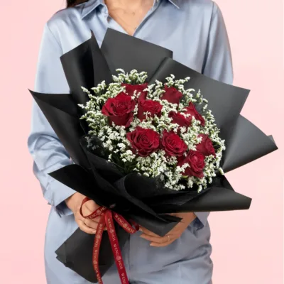 Passionate Red Rose Bouquet featuring fresh red roses and delicate gypsophila elegantly arranged in a sophisticated black wrapping.